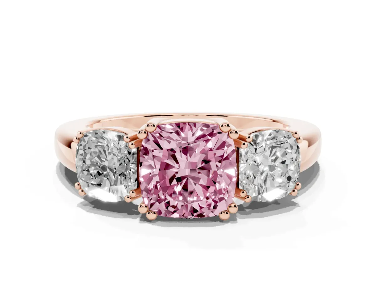Fancy Pink Three-Stone Cushion Cut Cut Diamond Ring with Channel Set Band and Four-Prong Setting Rose gold