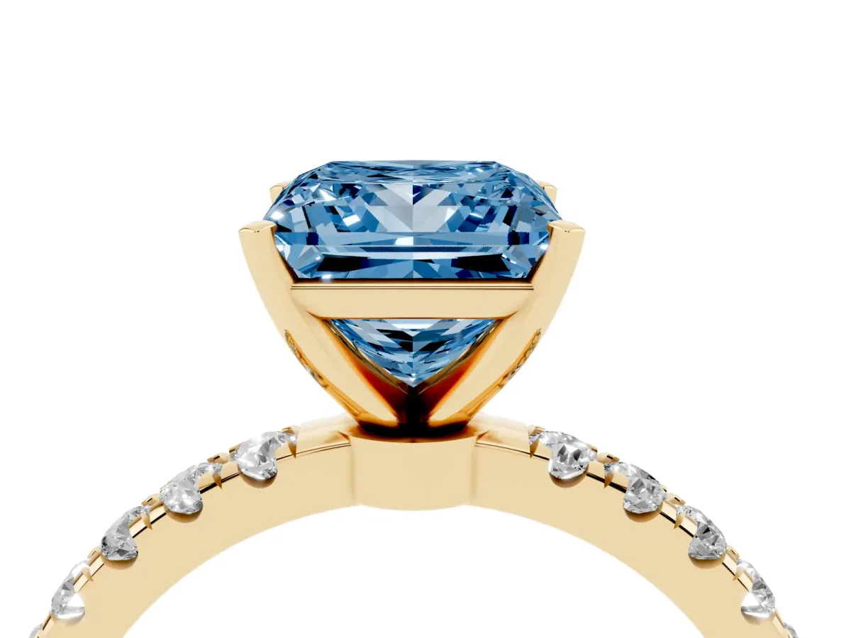 Fancy Blue Princess Cut Diamond Solitaire Ring with Pavé Accents and Four-Prong Setting Yellow gold