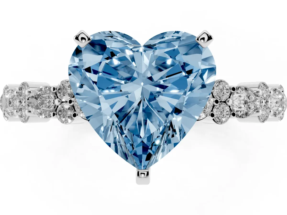 Fancy Blue Heart Cut Diamond Side Stone Solitaire Ring with Round and Four-Prong Setting Silver