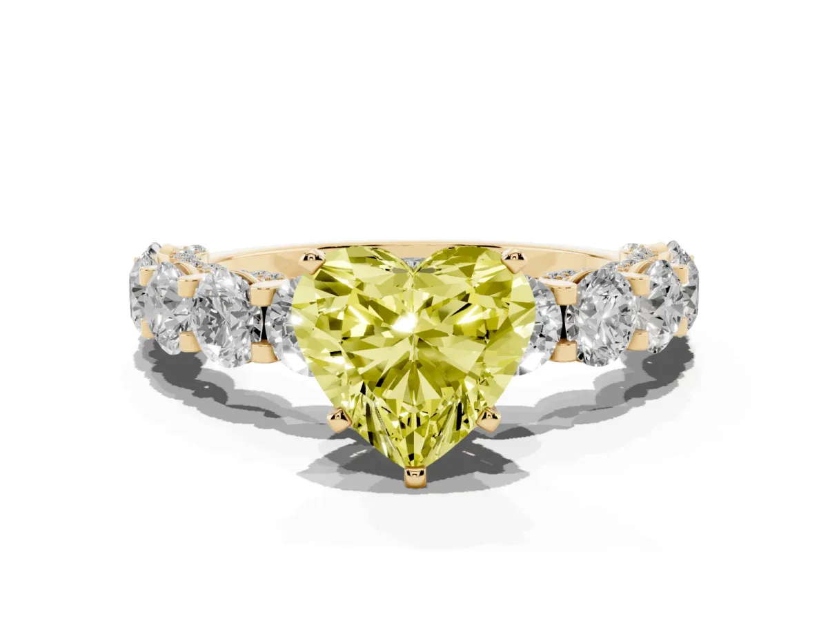 Fancy Yellow Heart Cut Diamond Side Stone Engagement Ring with Four-Prong Setting Yellow gold