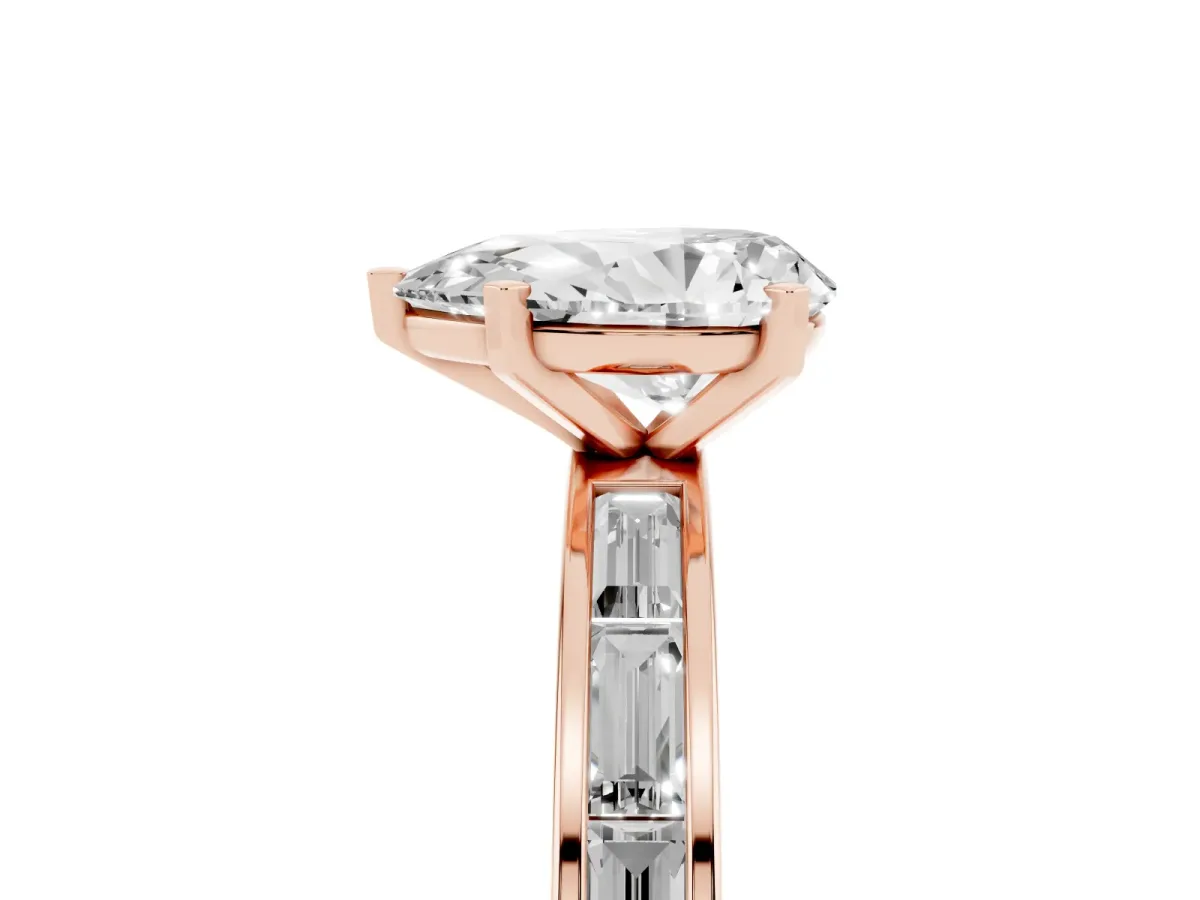Pear Cut Solitaire Diamond Ring with Channel-Set Baguette Band and Four-Prong Setting Rose gold