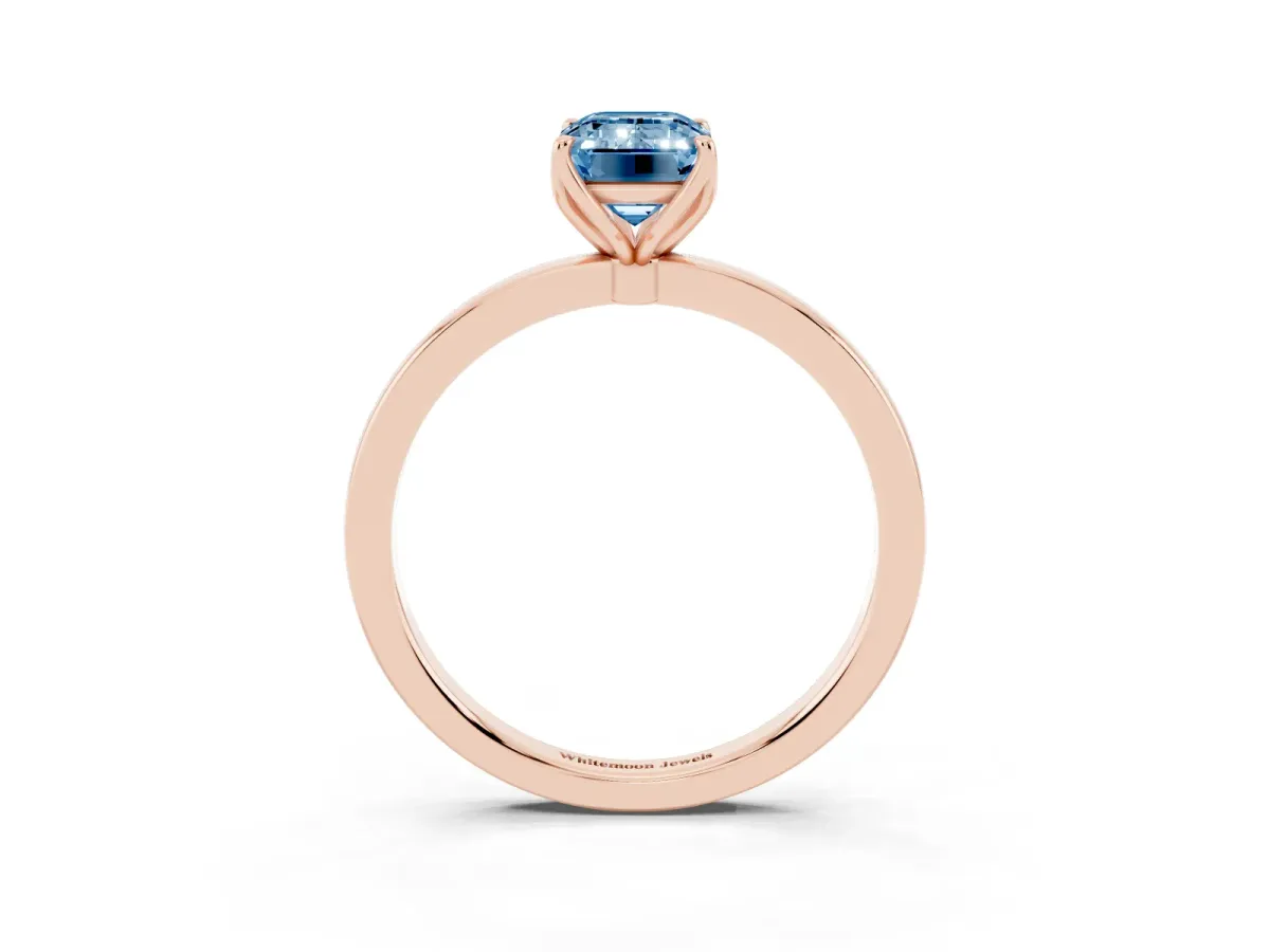 Fancy Blue Emerald Cut Diamond Solitaire Ring with Thin Band and Prong Setting Rose gold