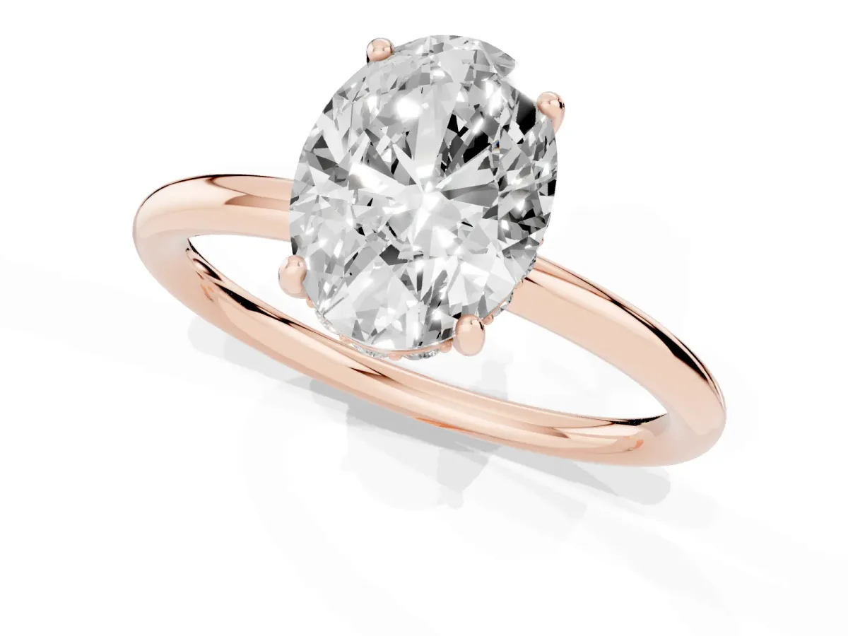 Oval Cut Solitaire Diamond Ring with a Classic Band and Four-Prong Setting Rose gold