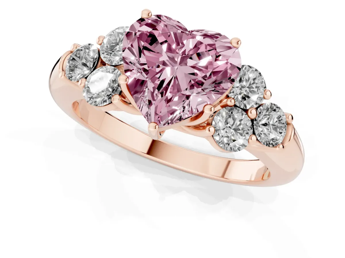 Fancy Pink Heart Cut Cut Diamond Cluster Ring with Round Accent Stones and Prong Setting on a Classic Band Rose gold