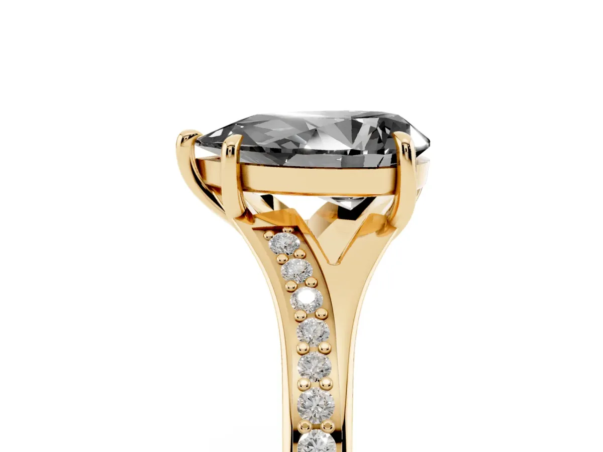 Fancy Black Pear Cut Diamond Solitaire Ring with Pavé Band and Prong Setting Yellow gold