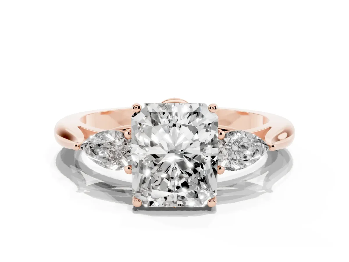 Radiant Cut Diamond Three-Stone Ring with Pear Side Stones and Prong Setting Rose gold