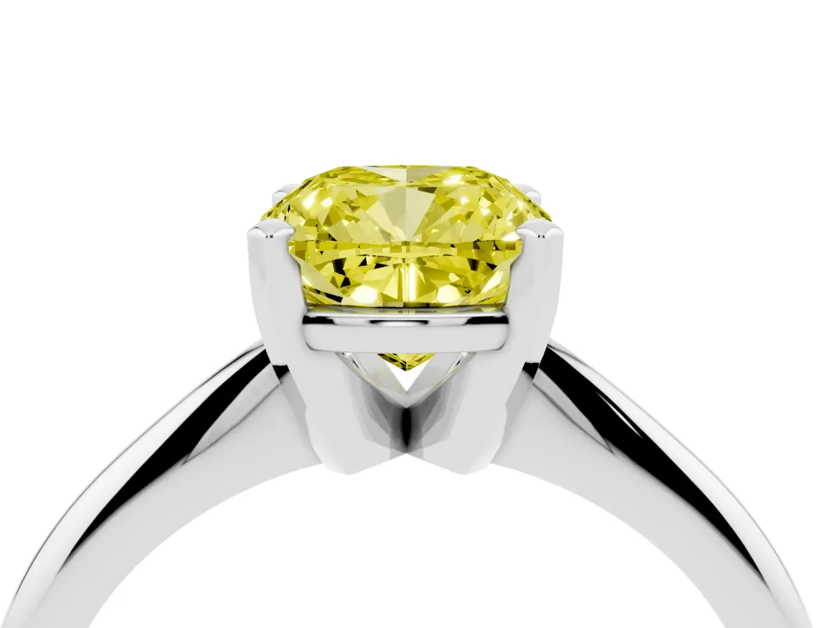 Fancy Yellow Cushion Cut Cut Solitaire Ring with Four-Prong Setting on a Classic Band Silver