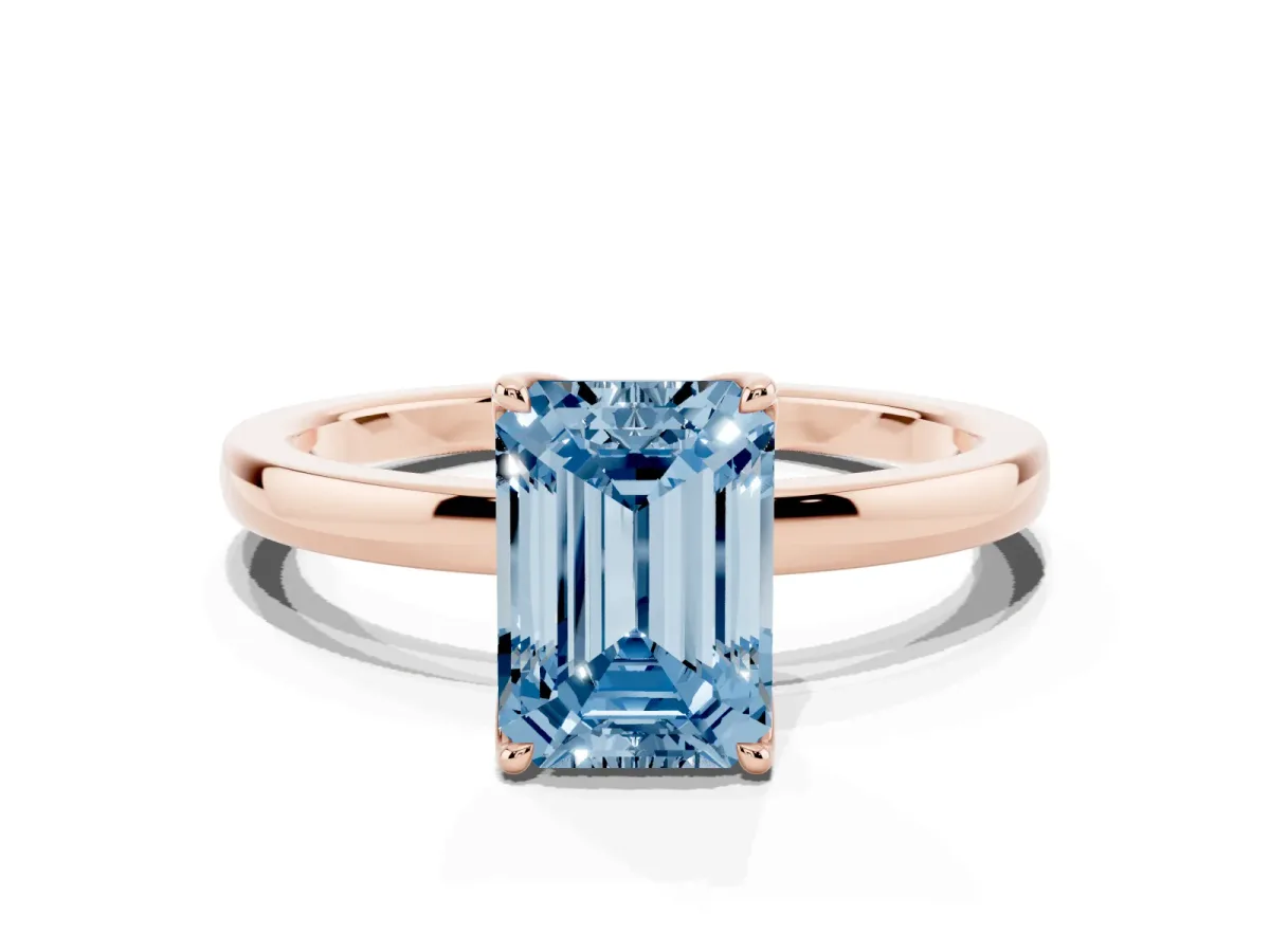 Fancy Blue Emerald Cut Diamond Solitaire Ring with Thin Band and Prong Setting Rose gold
