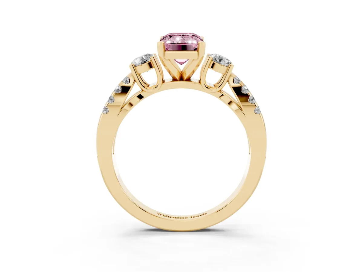 Fancy Pink Emerald Cut Diamond Three-Stone Ring with Pavé Split Shank and Four-Prong Setting Yellow gold