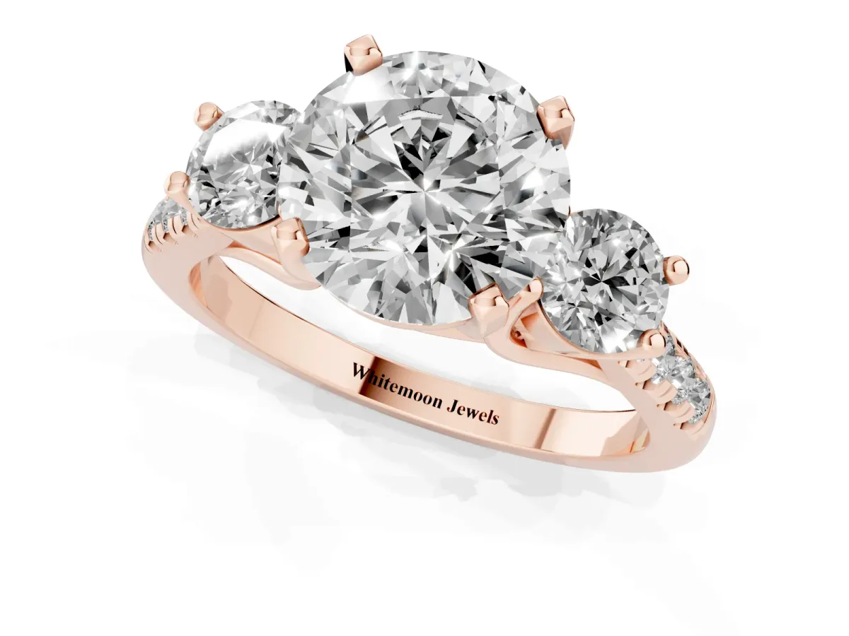 Three-Stone Round Cut Diamond Pavé Band with Four-Prong Setting Rose gold