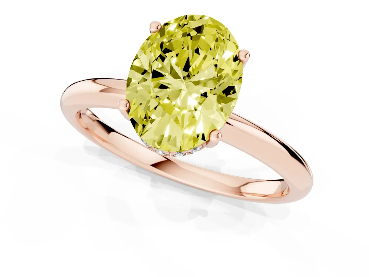 Fancy Yellow Oval Cut Cut Solitaire Engagement Ring with Four-Prong Setting and Classic Band Rose gold