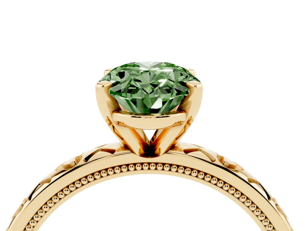 Fancy Green Oval Cut Solitaire Diamond Engagement Ring with XO Engraved Band and Four-Prong Setting Yellow gold