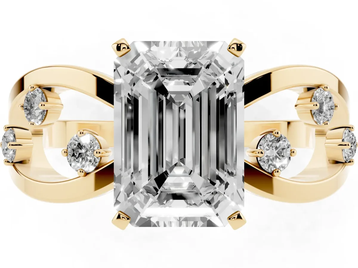 Emerald Cut Cut Solitaire Diamond with Side Stones on Criss-Cross Band and Four-Prong Setting Yellow gold