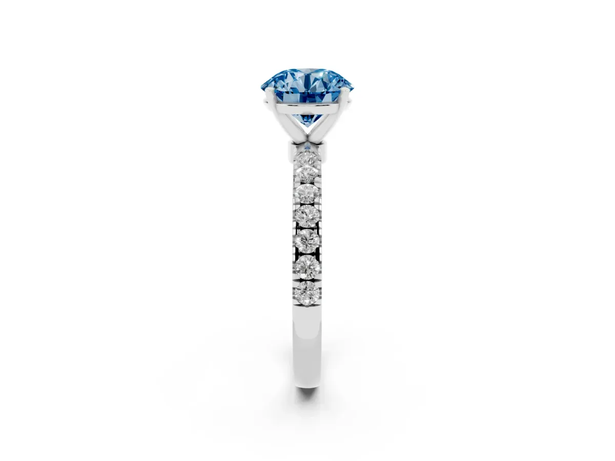 Fancy Blue Round Cut Diamond Solitaire Ring with Pavé Accents and Four-Prong Setting Platinum