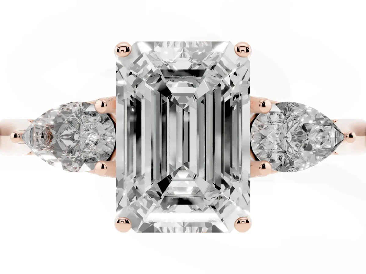 Three-Stone Emerald Cut Brilliant Diamond Solitaire Ring with Tapered Band and Four-Prong Setting Rose gold