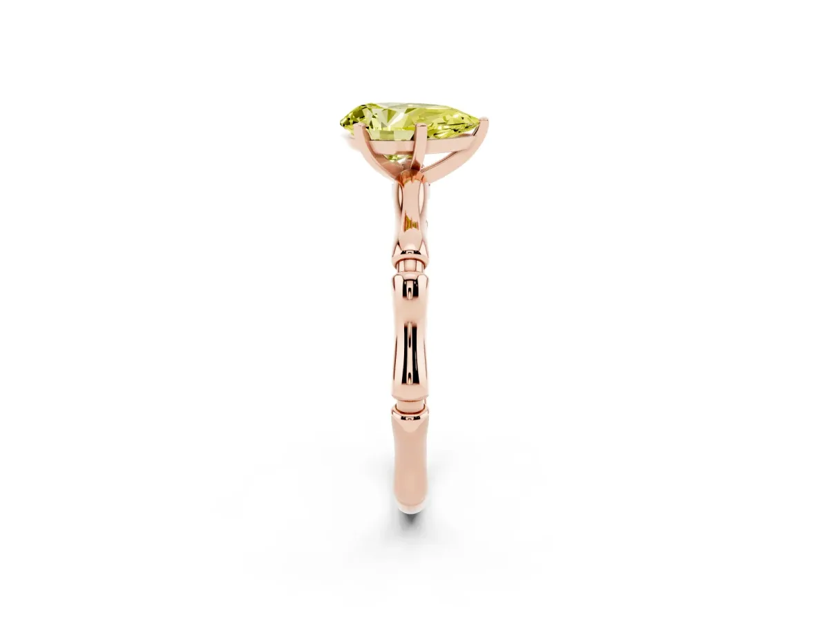 Fancy Yellow Pear Cut Solitaire Diamond Ring with Bamboo Band and Four-Prong Setting Rose gold