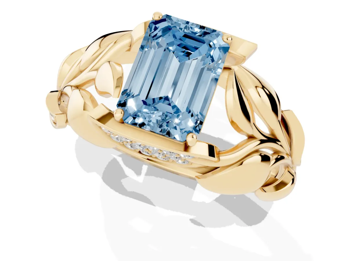 Fancy Blue Emerald Cut Diamond Leaf-Inspired Engagement Ring with Round Accents and Prong Setting Yellow gold