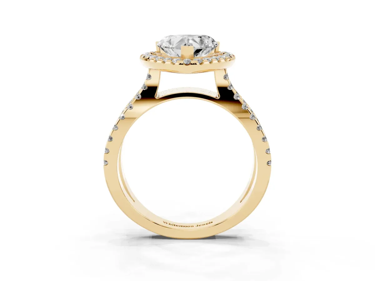 Heart Cut Diamond Halo Ring with Split Shank Pavé Band and Prong Setting Yellow gold