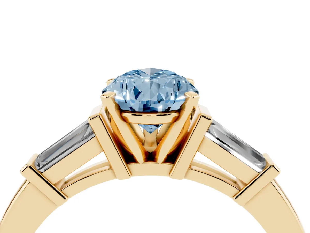 Fancy Blue Pear Cut Cut Diamond Solitaire Ring with Tapered Baguette Accents and Four-Prong Setting Yellow gold