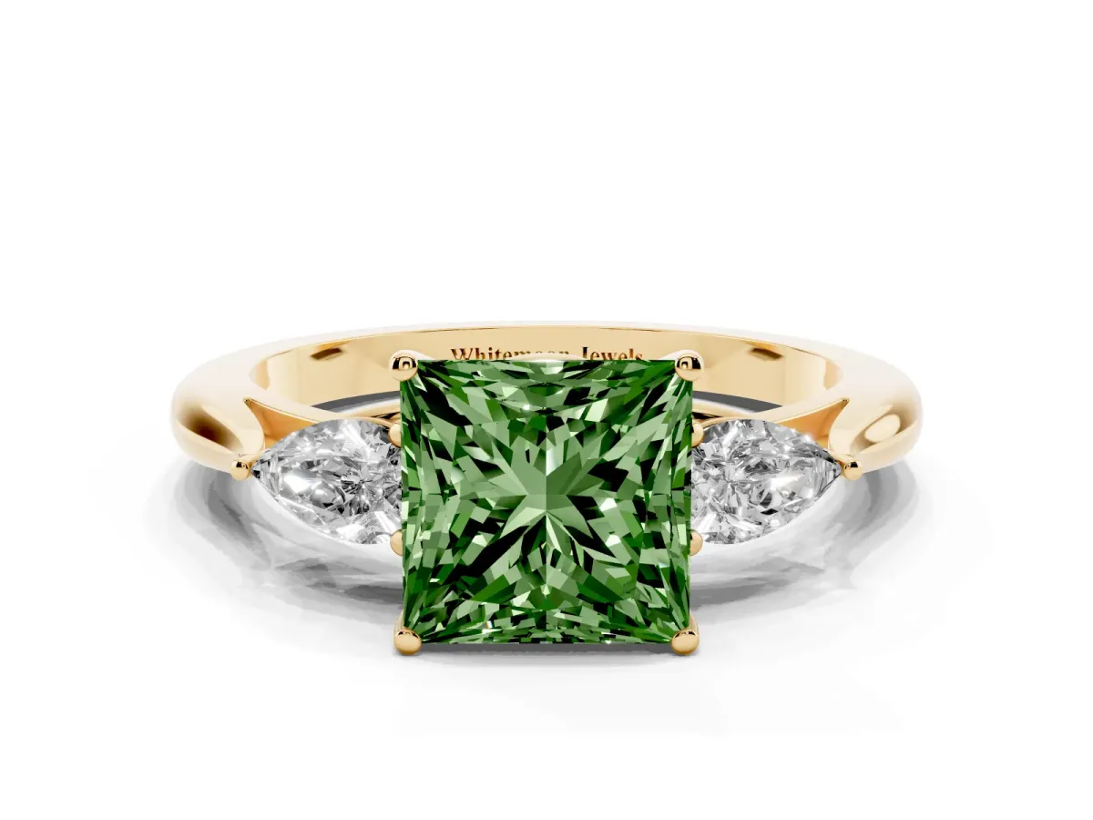 Fancy Green Three-Stone Princess Cut Diamond Ring with Pear Side Stones in Four-Prong Setting Yellow gold