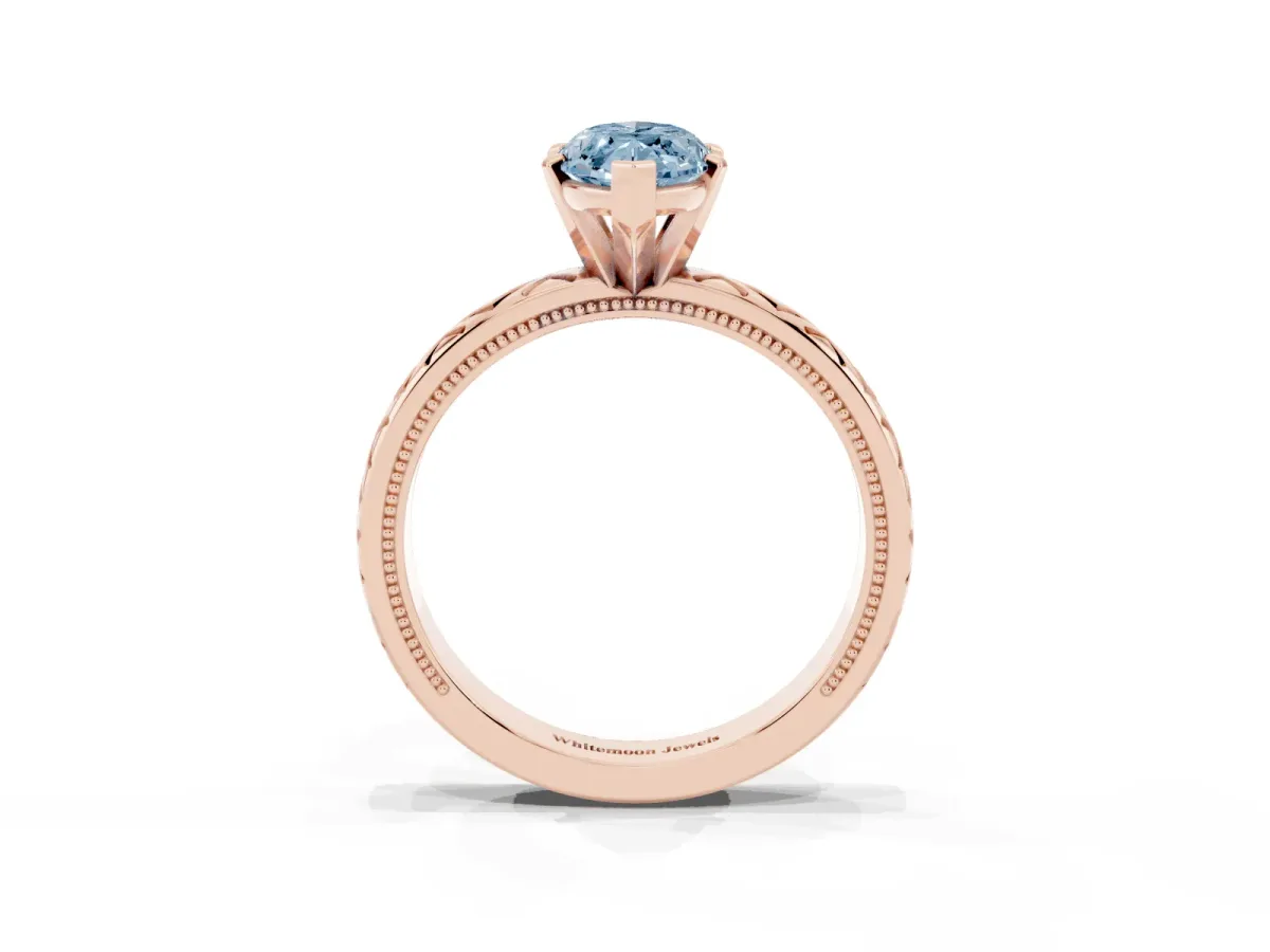 Fancy Blue Marquise Cut Solitaire Diamond Ring with Milgrain and Black Enamel X Pattern Band Rose gold