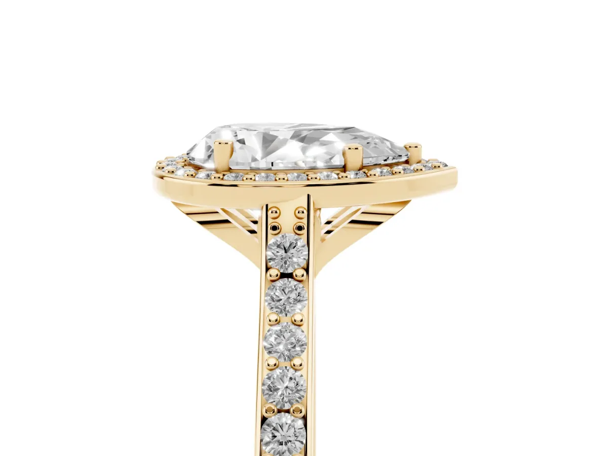 Pear Cut Diamond Halo Engagement Ring with Round Pavé Shoulders and Prong Setting Yellow gold