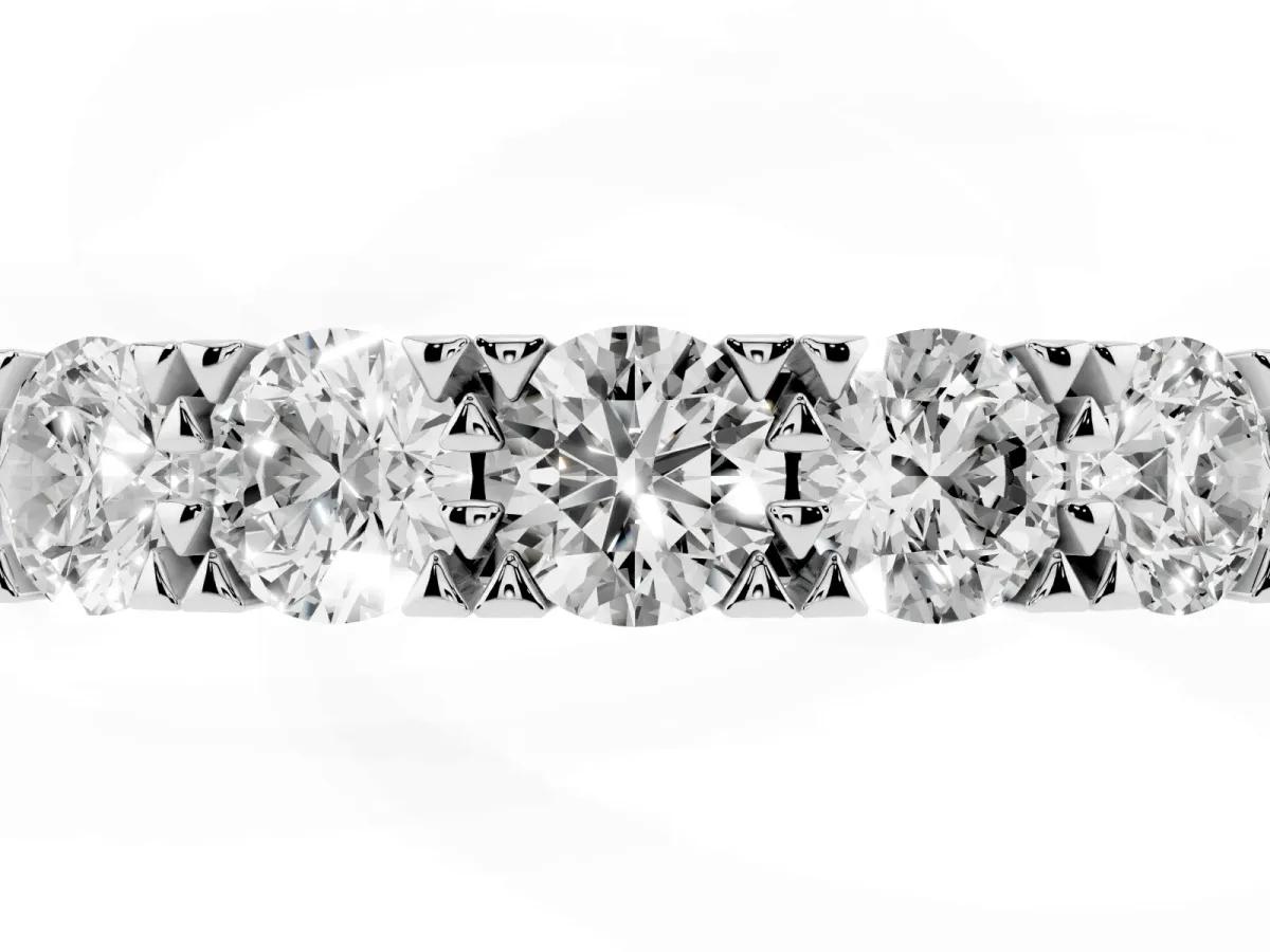 Round Diamond Channel Set Half Eternity Band with Shared Prong Setting White gold
