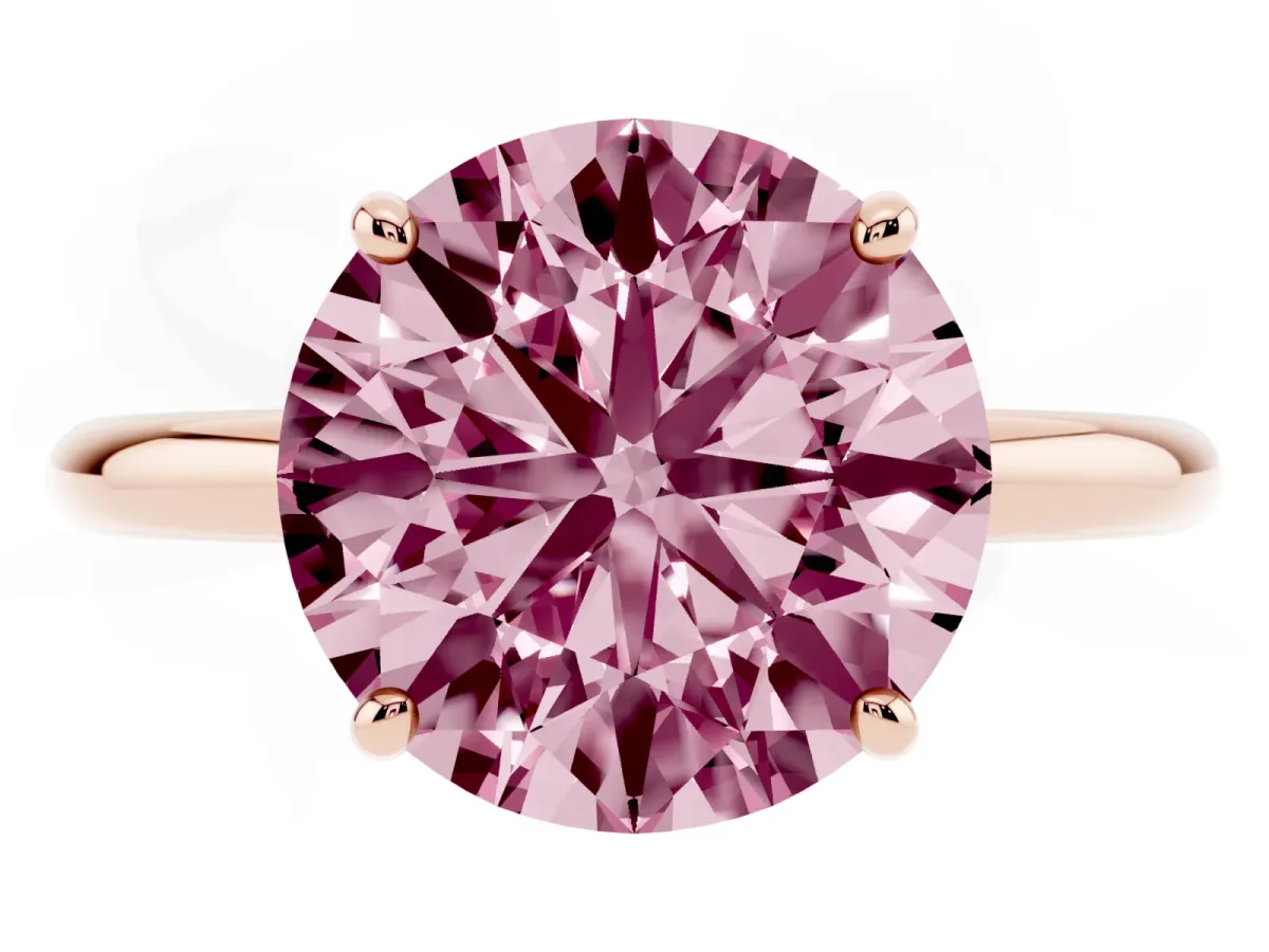 Fancy Pink Round Cut Solitaire Diamond Ring with Four-Prong Setting on a Plain Band Rose gold