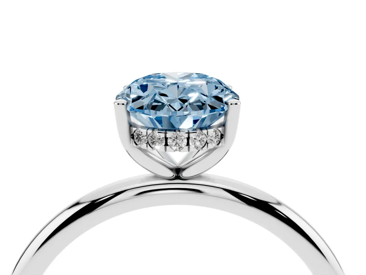Fancy Blue Oval Cut Cut Solitaire Engagement Ring with Four-Prong Setting and Classic Band Silver