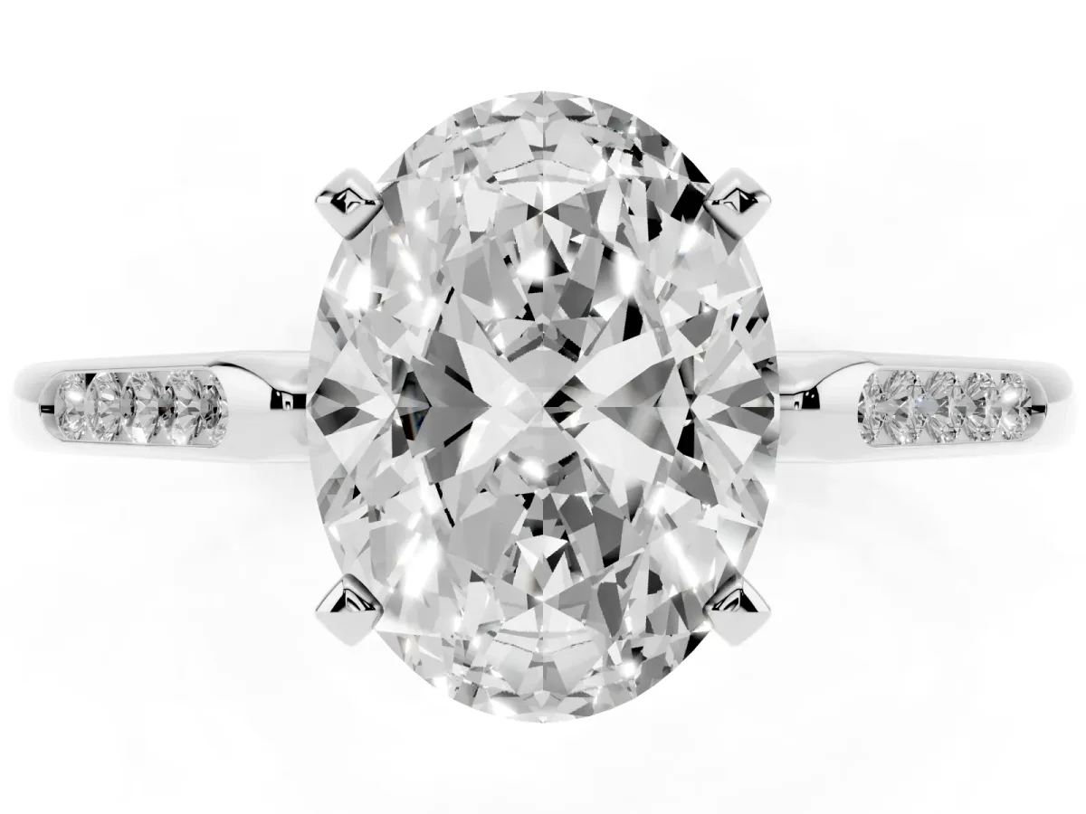 Oval Cut Diamond Solitaire Ring with Channel Set Round Band and Prong Setting Silver