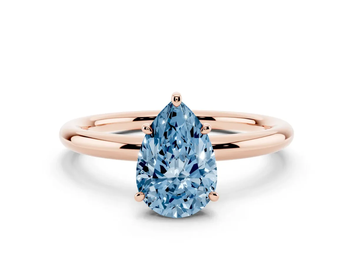 Fancy Blue Pear Cut Solitaire Diamond Ring with Four-Prong Setting on a Plain Band Rose gold