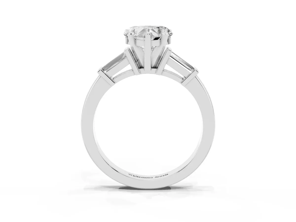 Heart Cut Cut Diamond Solitaire Ring with Tapered Baguette Accents and Four-Prong Setting White gold