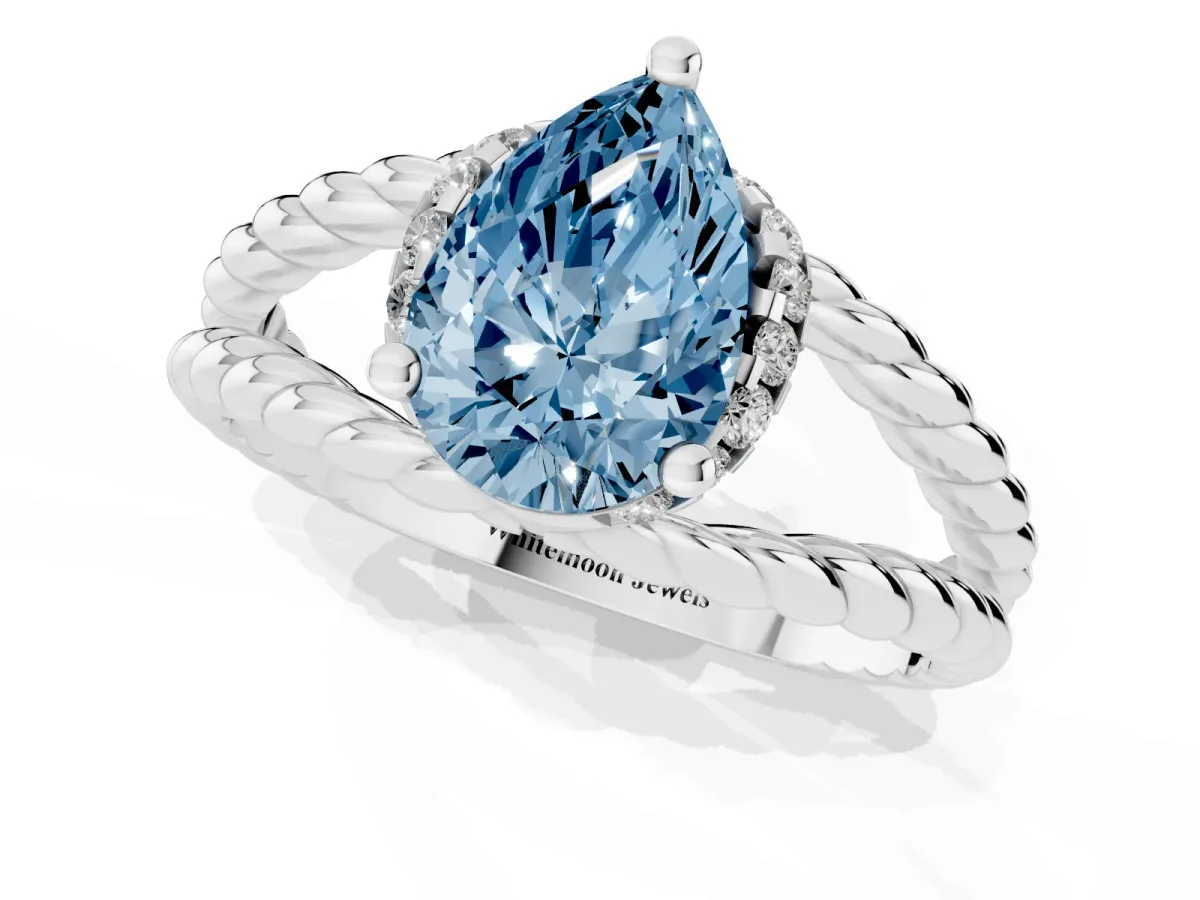 Fancy Blue Pear Cut Halo Twisted Band Four-Prong Ring Silver