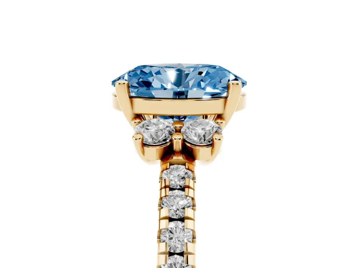 Fancy Blue Oval Cut Diamond Three-Stone Pave Band with Four-Prong Setting Yellow gold