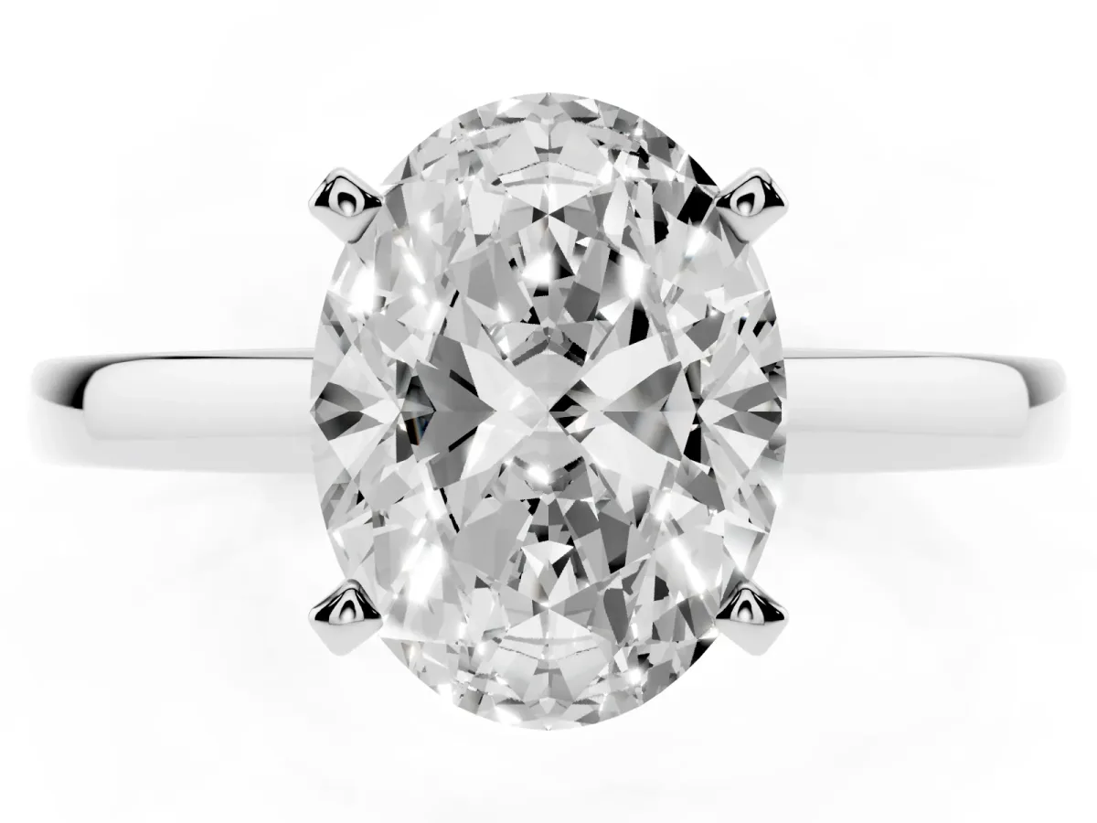 Oval Cut Solitaire Diamond Engagement Ring with Four-Prong Setting on a Classic Band Silver