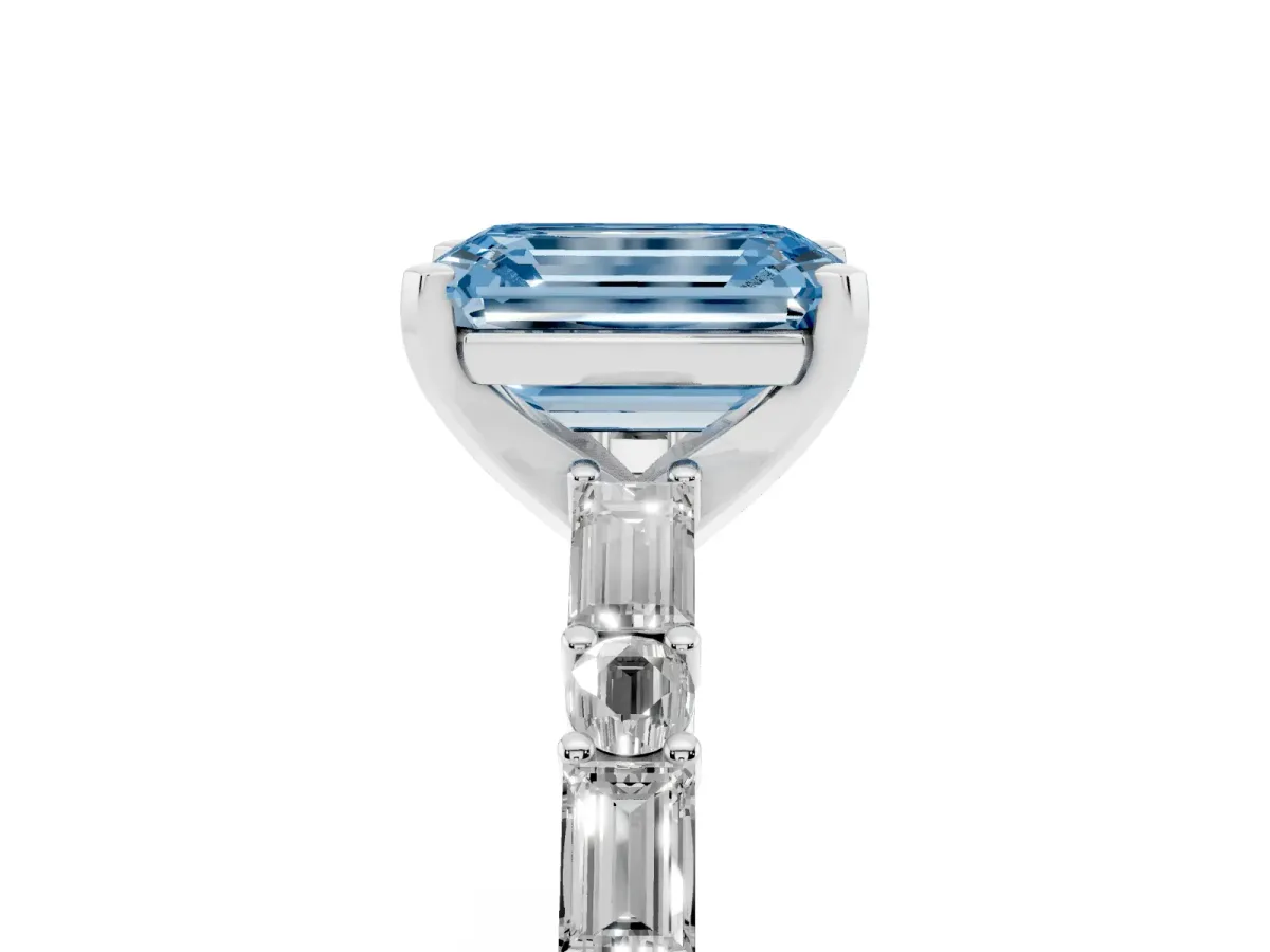 Fancy Blue Emerald Cut Diamond Solitaire with Side Baguettes and Channel Set Band Platinum