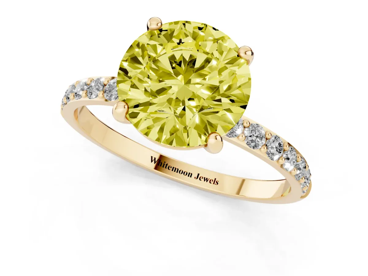 Fancy Yellow Round Cut Diamond Solitaire Ring with Round Pavé Band and Prong Setting Yellow gold