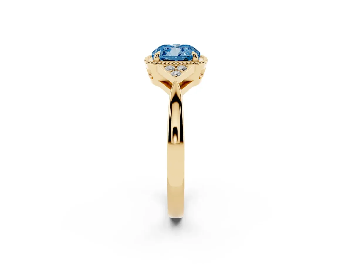 Fancy Blue Cushion Cut Diamond Halo Ring with Tapered Band and Four-Prong Setting Yellow gold
