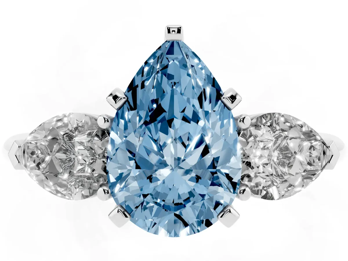 Fancy Blue Three-Stone Pear Cut Diamond Ring with Pear Side Stones and Four-Prong Setting Silver