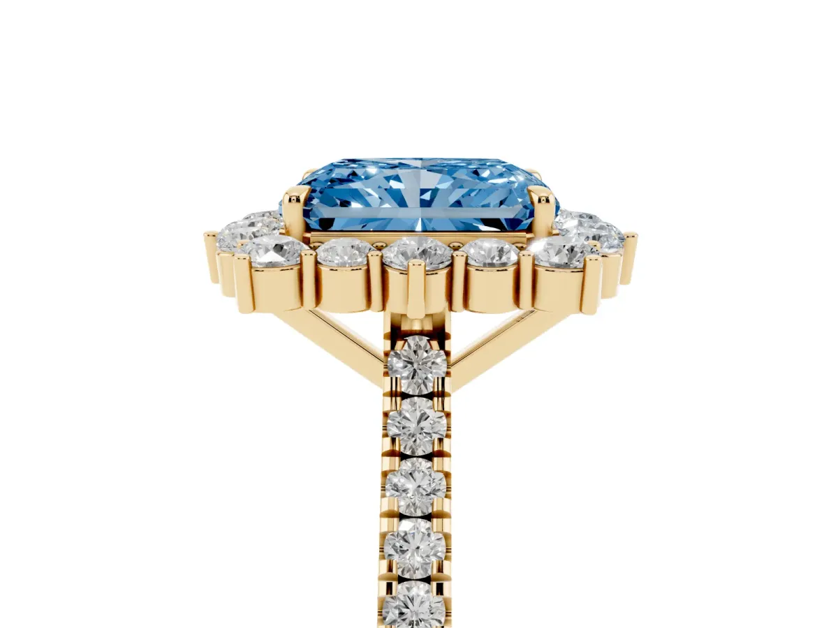 Fancy Blue Radiant Cut Halo Diamond Ring with Pavé Band and Prong Setting Yellow gold