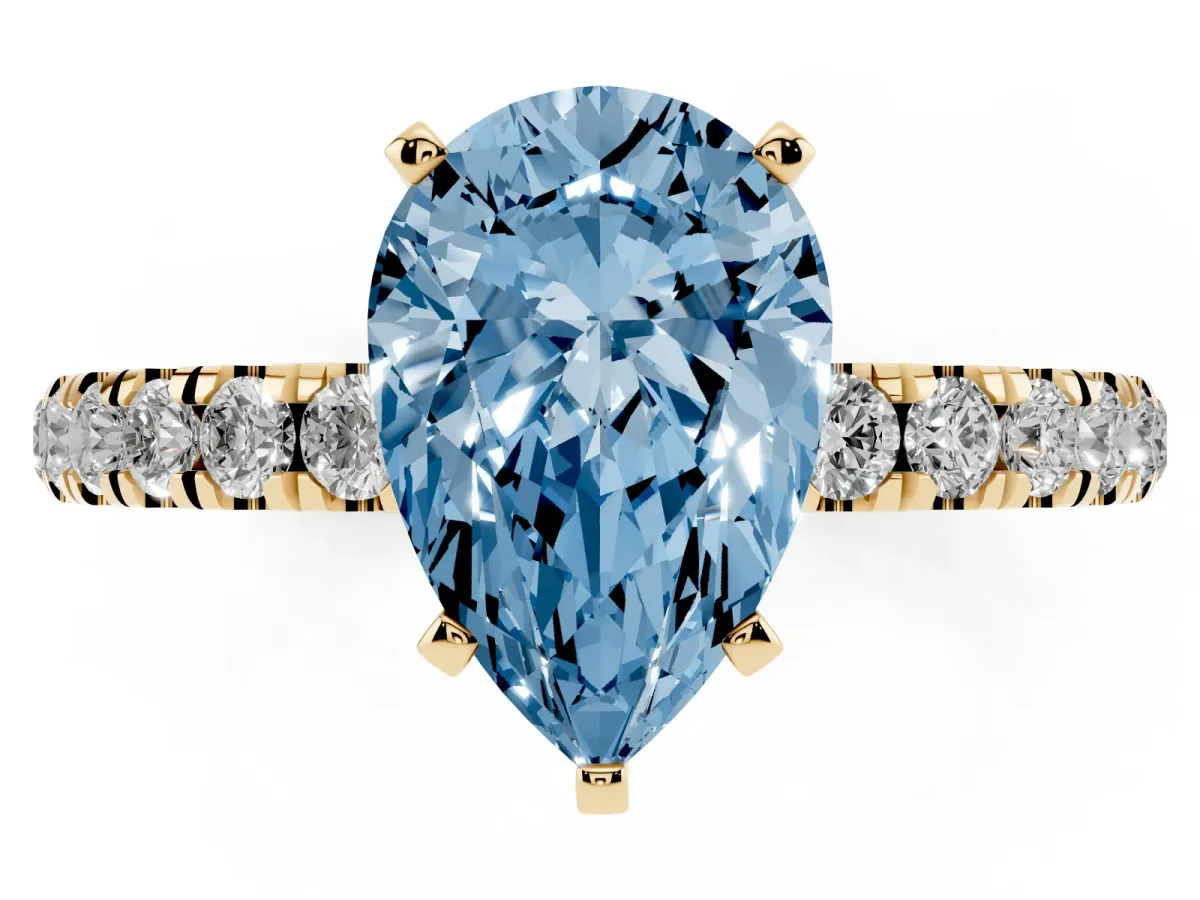 Fancy Blue Pear Cut Diamond Solitaire Ring with Pavé Accents and Four-Prong Setting Yellow gold