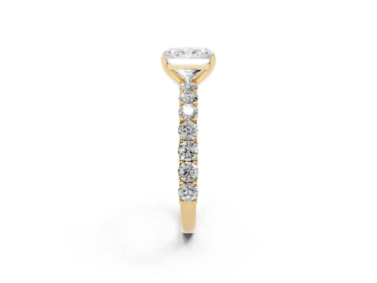 Radiant Cut Diamond Solitaire Ring with Shared Prong Pavé Band and Four-Prong Setting Yellow gold