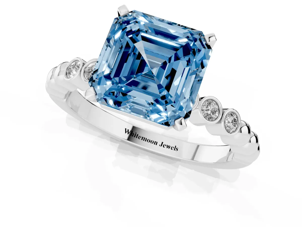 Fancy Blue Asscher Cut Solitaire Bezel Accent Diamond Engagement Ring with Beaded Band and Four-Prong Setting White gold