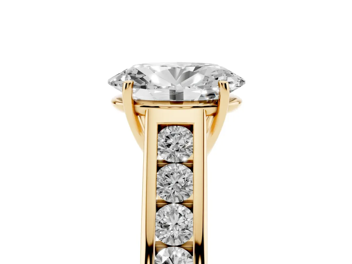 Oval Cut Brilliant Channel-Set Solitaire Ring with Four-Prong Setting Yellow gold
