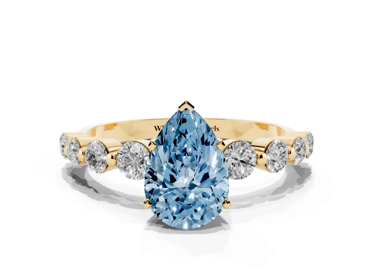 Fancy Blue Pear Cut Solitaire Diamond Ring with Pave Band and Four-Prong Setting Yellow gold