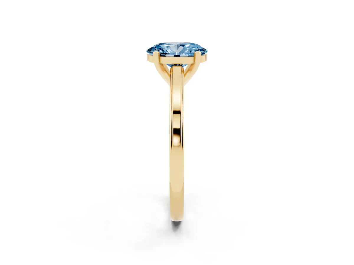 Fancy Blue Oval Cut Solitaire Diamond Ring with Four-Prong Setting and Classic Band Yellow gold