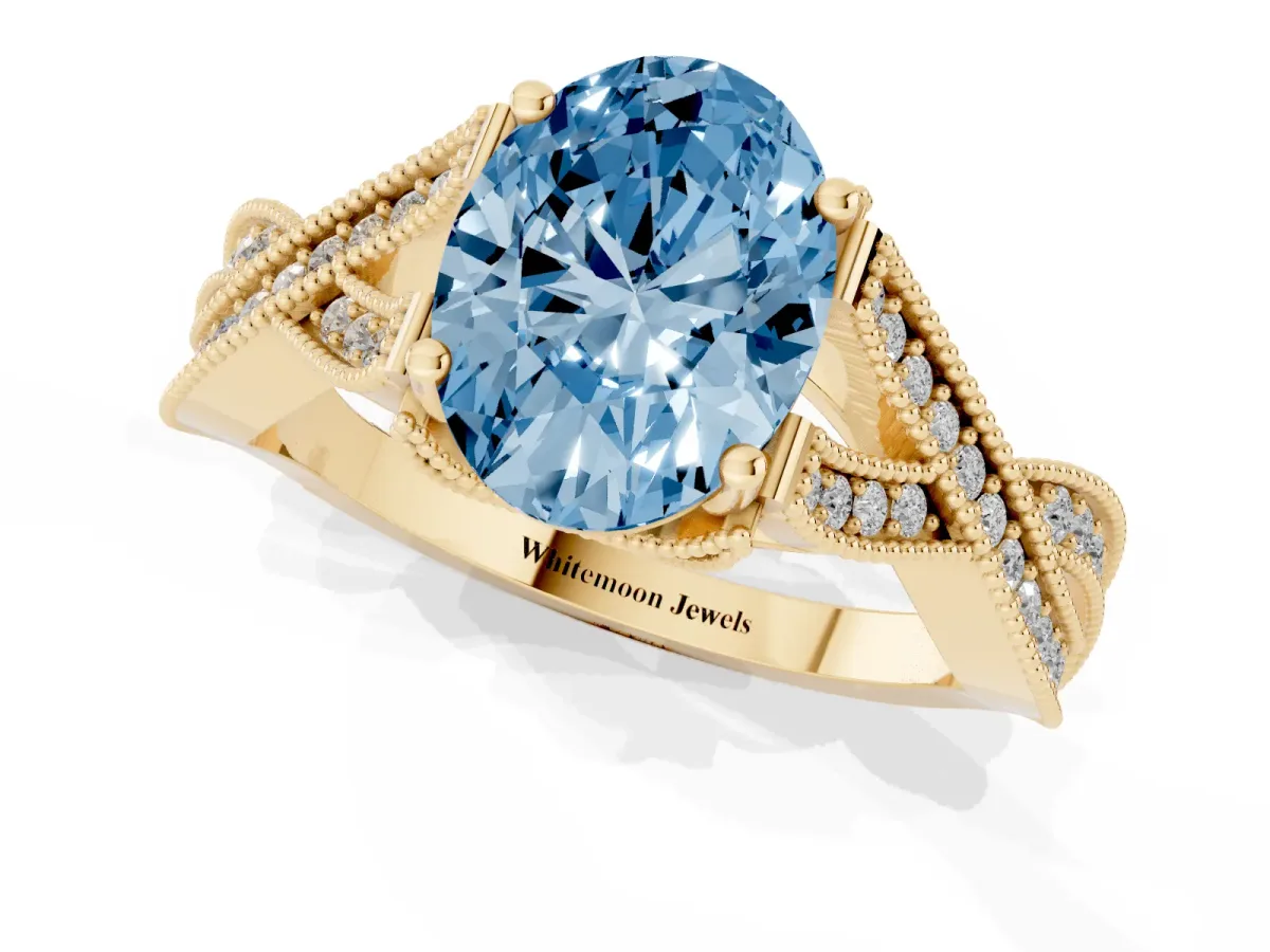Fancy Blue Oval Cut Cut Diamond Twisted Band with Milgrain Pave Setting and Four-Prong Setting Yellow gold