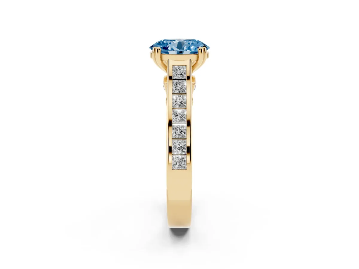 Fancy Blue Oval Cut Cut Channel Set Solitaire Engagement Ring with Prong Setting Yellow gold