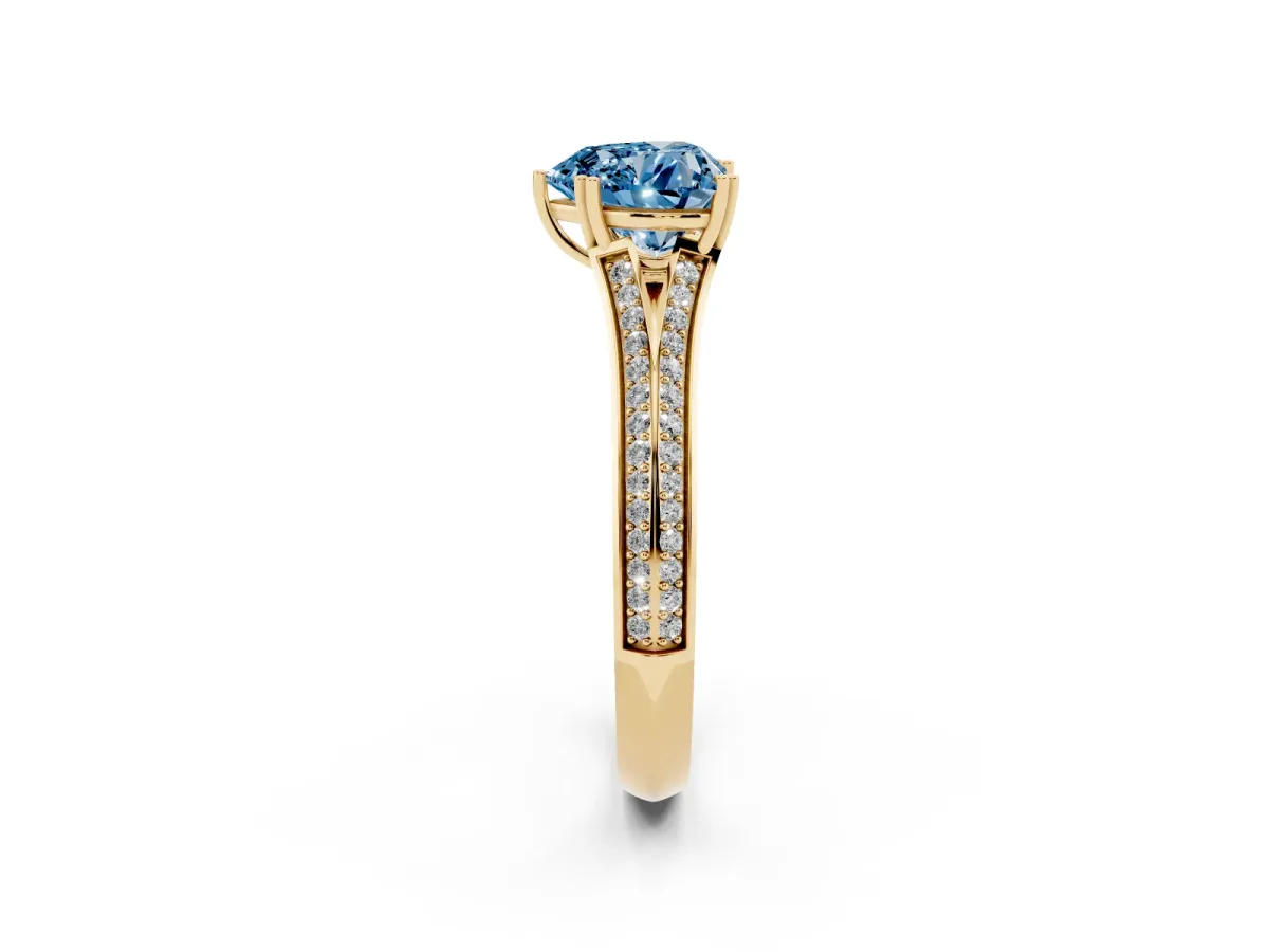 Fancy Blue Heart Cut Diamond Split Shank Engagement Ring with Pavé Band Yellow gold