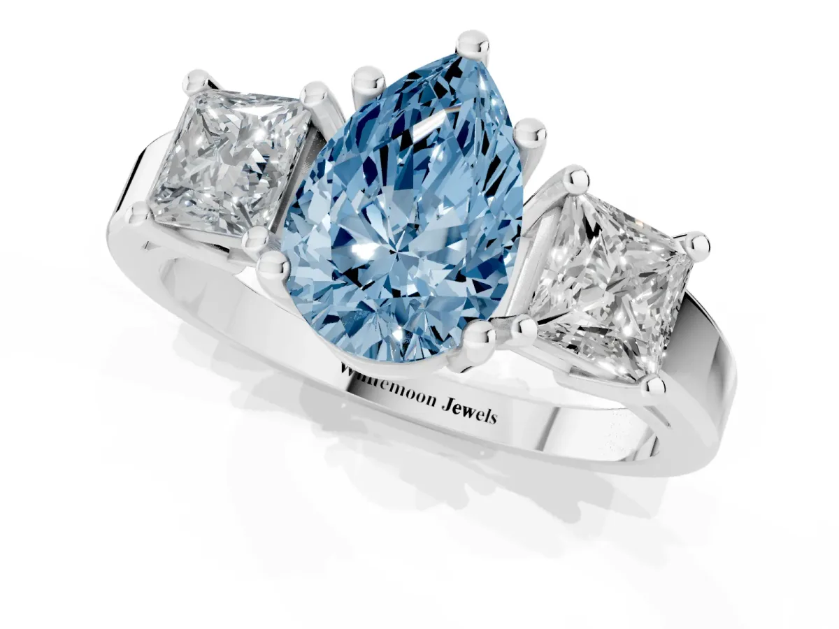 Fancy Blue Three-Stone Pear Cut Cut Solitaire Ring with Prong Setting White gold